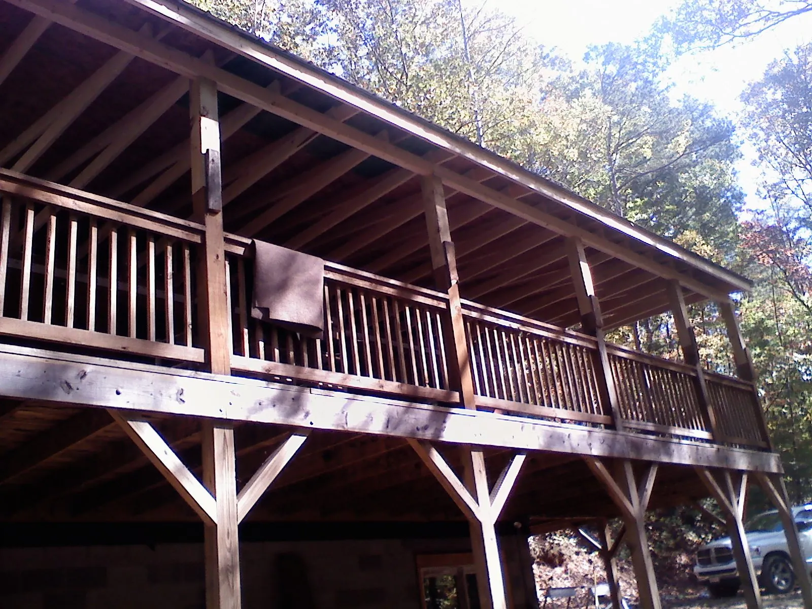 Timber framing under a new elevated porch and deck in Middlesboro